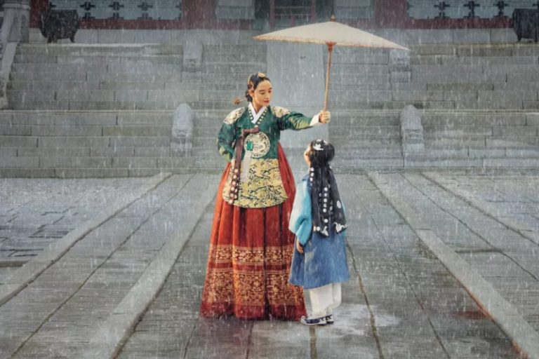 Under The Queen’s Umbrella