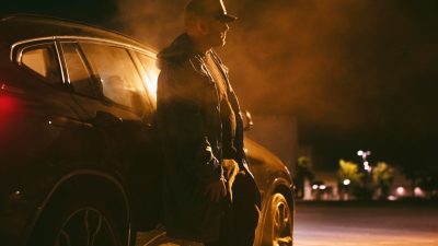 man sitting car night 23 2149001291