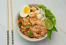 thai food noodles spicy boil with pork boil egg e1734497159207